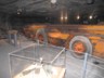 This machine scoops up loose salt andosits in on a conveyor 